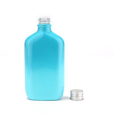 Новый дизайн цветной стеклянной бутылки с распылителем для косметики
